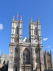 Obraz premium The Union Flag flying half-mast on the Westminster Abbey and Victoria Tower in London, UK
