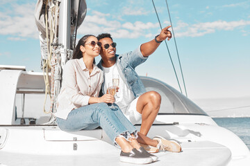 Happy couple, travel and yacht in the ocean for a summer romance on lovely luxury holiday vacation....