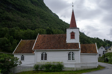 Fototapeta na wymiar Undredal, Norway - June 19, 2022: Undredal village in Aurland Municipality in Vestland county, located along the Aurlandsfjorden which is a branch off the massive Sognefjorden. Selective focus