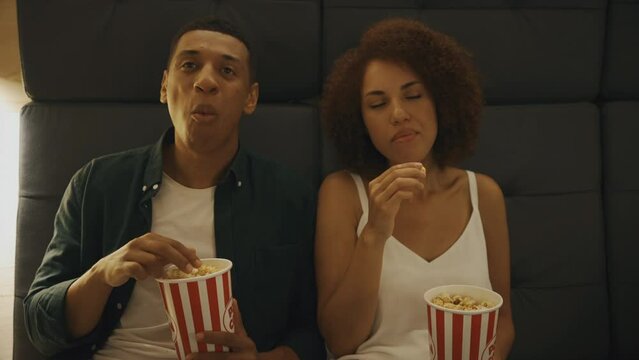 Two young people came to watch a movie. 