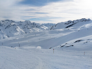 Fototapeta na wymiar Ski lift shadow on a ski slope, in the Austrian ski resort of Sölden