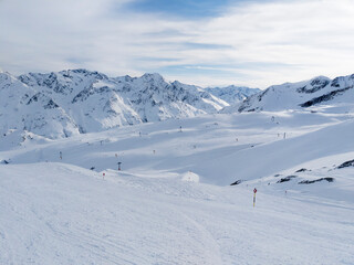 Fototapeta na wymiar Ski lift shadow on a ski slope, in the Austrian ski resort of Sölden