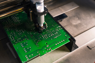 Soldering paste dispenser machine used on printed circuit board PCB surface. Machine production....