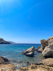 Beautiful rocky scenery near Koubara beach in Ios island Cyclades, Greece