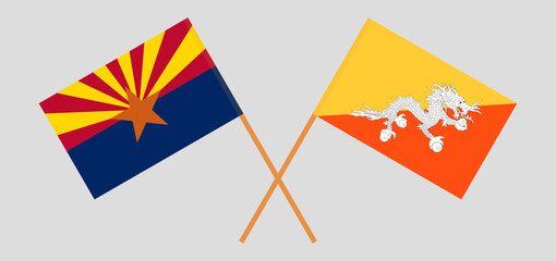 Crossed flags of the State of Arizona and Bhutan. Official colors. Correct proportion