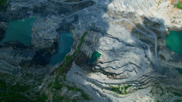 Drones are flying over beautiful quarry. stone industry. heavy industry and construction concept. aerial drones footage. 4K
