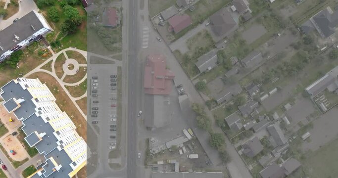 transition on video of flight over the city with result before and after color grading with applying the lut, look up table, to video raw log file