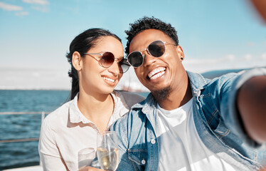 Couple selfie on yacht in ocean celebrate with champagne on vacation or holiday in summer. Happy young man with luxury wine, cruise at sea with woman for celebration or honeymoon travel on ship