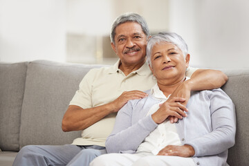 Portrait of senior couple relax with love on a home living room sofa happy, smile and enjoy peace,...