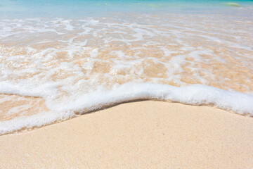 Fototapeta na wymiar 美しいビーチの波打ち際