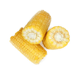 Pieces of corncobs on white background, top view