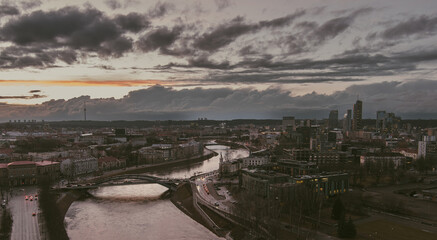 Beautiful Vilnius city panorama in winter. Aerial sunset view. Winter city scenery in Lithuania.