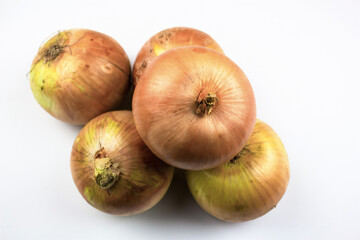 Bulb onion isolated on white background. Unpeeled, raw onion.