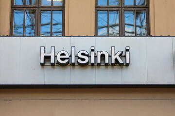 Fototapeta na wymiar Helsinki sign in the central train station