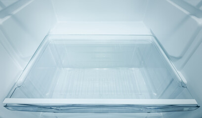 Refrigerator open empty fridge inside interior. close up on empty refrigerator with door open. New clean refrigerator