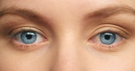 Blue eyes woman, focus and vision in eye care sight, eyelid blink with detail pupil and iris. Portrait closeup of a female in focused healthy eyesight or optometry treatment looking in concentration - Powered by Adobe