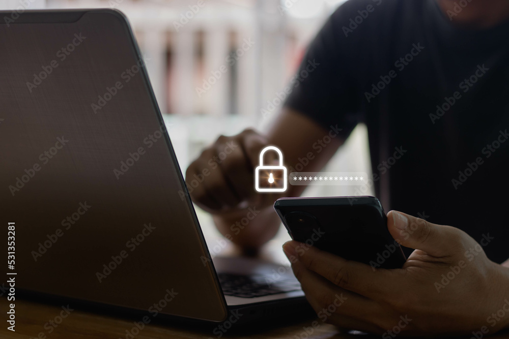 Poster asian businessman using the smart mobile phone to access on phone with laptop for validate password 