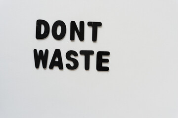 don't waste - black chalk letters