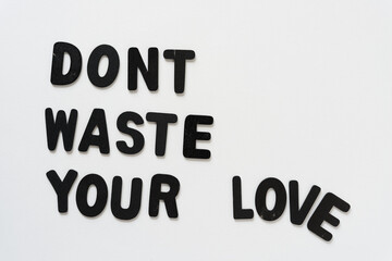 don't waste your love - black chalk letters