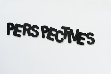 perspectives - black chalk letters