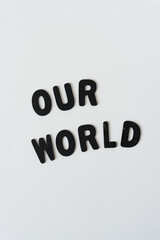 our world - black chalk letters