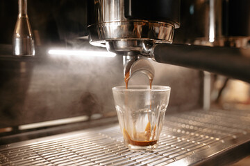 pouring coffee into a glass