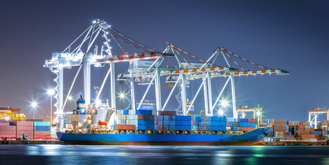 Container ships in the export and import business and logistics Deliver goods to the pier by crane...