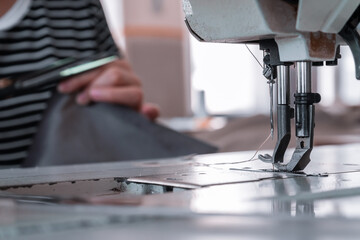Sewing machine needles close-up in the workshop