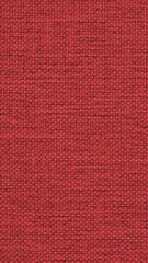 Dark red woven surface closeup. Textile texture similar to linen fabric. Sewing vertical background. Textured mobile phone wallpaper. Macro