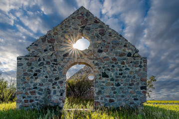Sunburst through the remaining stone walls of Bethlehem Lutheran Church between Southey and...