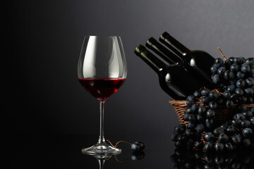Red wine and blue grapes.