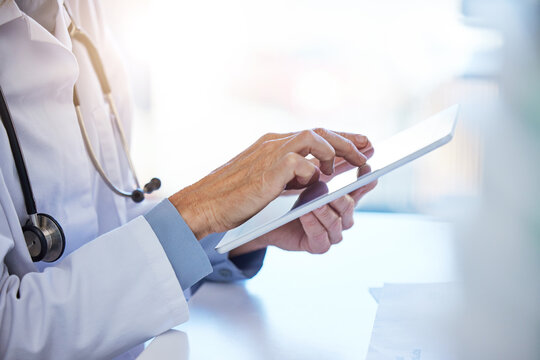 Doctor Tablet, Hospital Planning And Consulting With People On The Internet, Reading Clinic Schedule And Communication Online At Work. Healthcare Nurse Typing On Technology While Working As A Medic