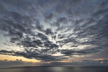 Obraz premium Beautiful red epic sunset sunrise and dramatic clouds over the dreamy sea - Bali