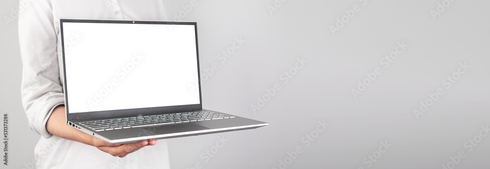 Poster Banner with hands holding laptop mockup. Person showing presentation at business meeting. Using computer technologies at work. Place for text