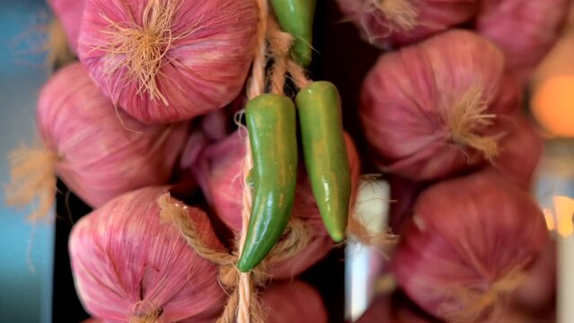 Red onion with green pepper bundle