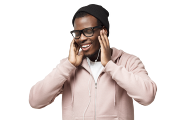 Close up shot of attractive young black guy singing his favourite song, listening cool track, feeling the rhythm and vibes