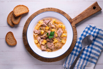 Pork stew with potatoes. Traditional tapas recipe from the north of Spain.