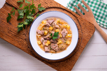 Pork stew with potatoes. Traditional tapas recipe from the north of Spain.