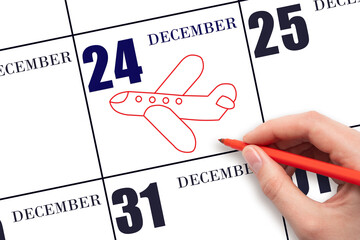 A hand drawing outline of airplane on calendar date 24 December. The date of flight on plane.