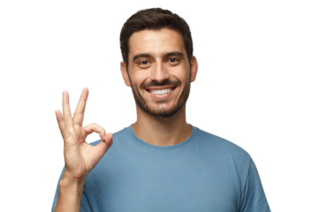 Young man smiling, gesturing, showing OK sign. Caucasian male showing okay gesture with his fingers