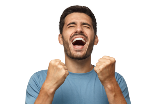 Young man shouting with closed eyes, celebrating victory, squeezing fists in deep emotional expression of happiness and luck