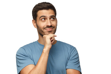 Portrait of young man in blue t-shirt with dreamy cheerful expression, thinking, isolated