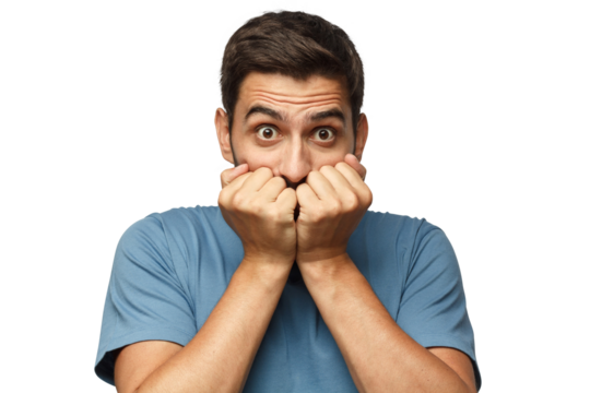 Astonished young male covering his mouth with both hands, looking shocked. Surprised, embarrassed and confused man