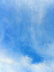Stunning blue cloudy sky vertical background