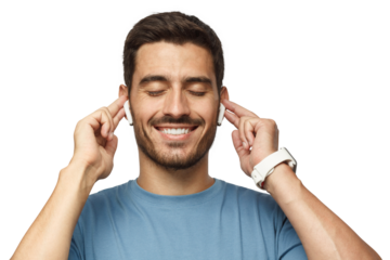 Smiling young man in blue t-shirt listening his favourite song or cool track, feeling the rhythm and vibe with eyes closed