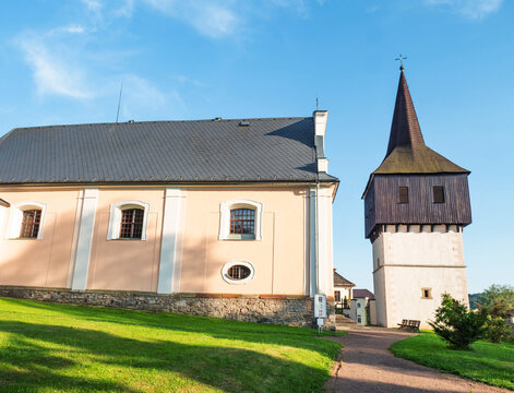 Wooden renaissance bell tower at the Church of All Saints , Hronov Czech