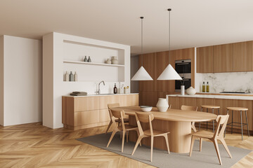 Obraz na płótnie Canvas Light kitchen interior with dining area and countertop, kitchenware