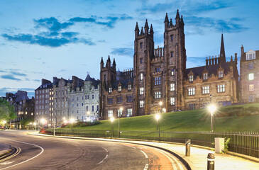 Edinburgh Old town of street Mound with New College, The University, Scotland panorama at night