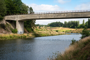 Fototapeta na wymiar Courcelles, Wallon Region, Belgium, Bridge over the sea canal with green nature surroundings