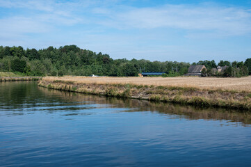 View over the River Sambre, agriculture fields and farmhouses, Belgium